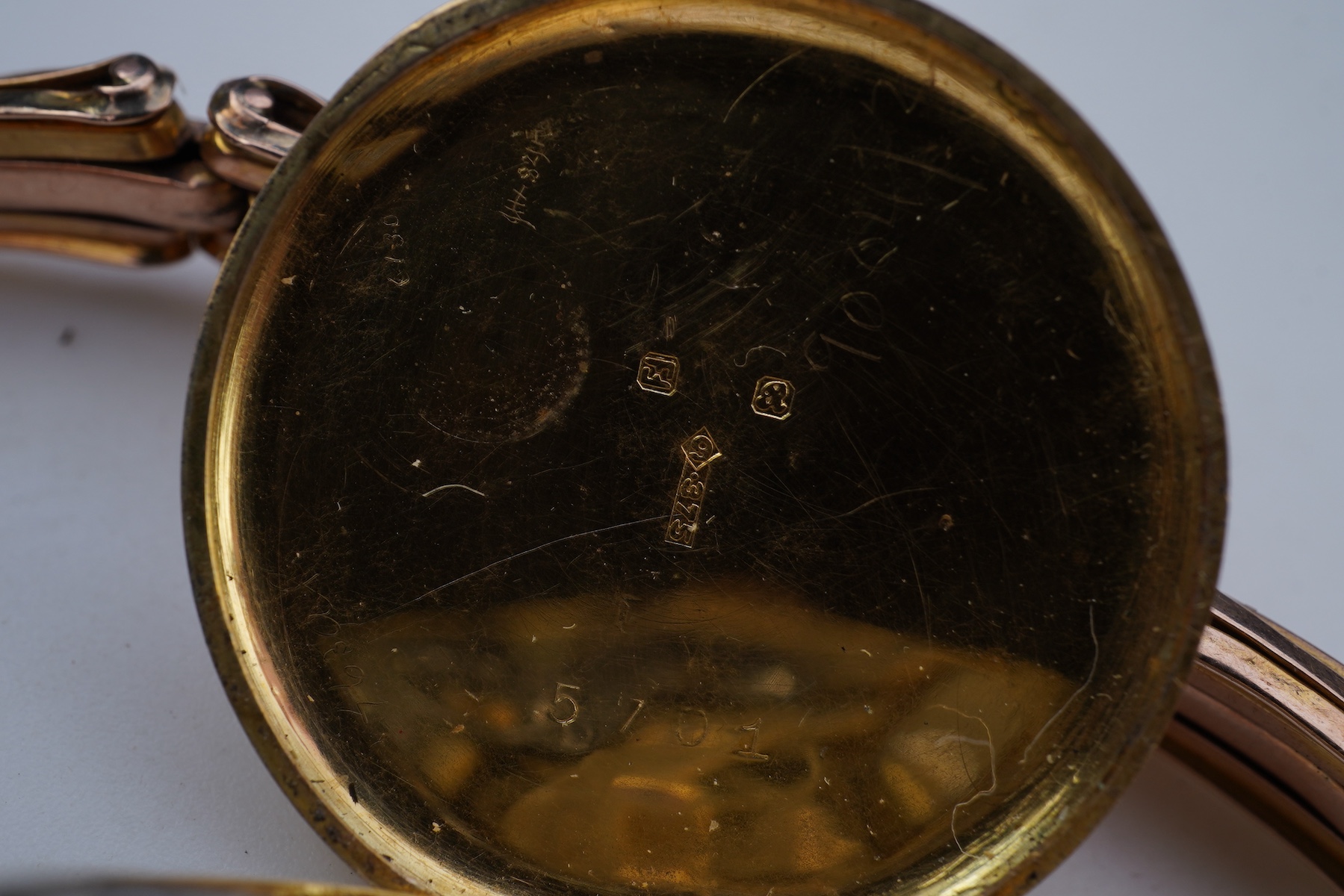 Two gold bracelets and a gold watch